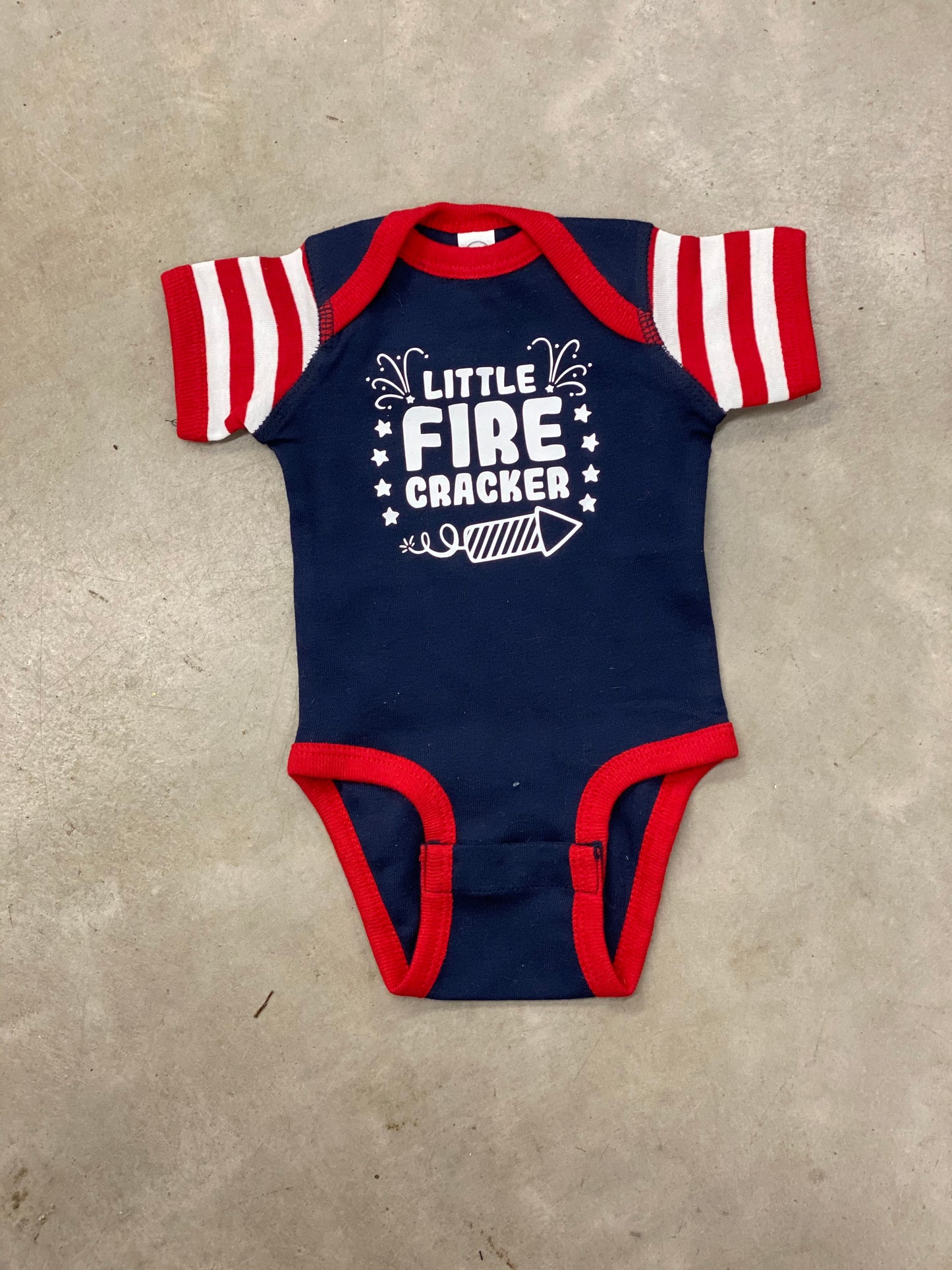 LITTLE FIRECRACKER BABY ONESIE